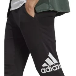 ADIDAS Men's Essentials Tapered Badge Of Sports Pants 9 ADIDAS Men's Essentials Tapered Badge Of Sports Pants -Fam By Style 2084554 001 alt3